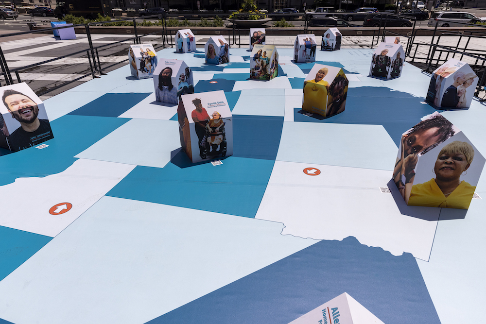 "Communities of Care" created by Artist Paola Mendoza, Illuminates the work of essential care workers at Freedom Plaza on July 13, 2021 in Washington, DC. 