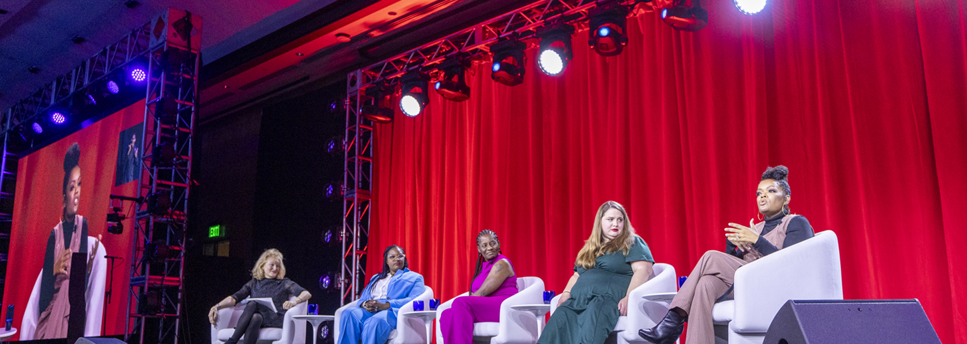 Krista Tippett, Caring Across staff member Aisha Adkins, Bonnie Okoth of National Domestic Workers Alliance, Maria Town of American Association of People with Disabilities, and Yvette Nicole Brown speak on a panel at CareFest.