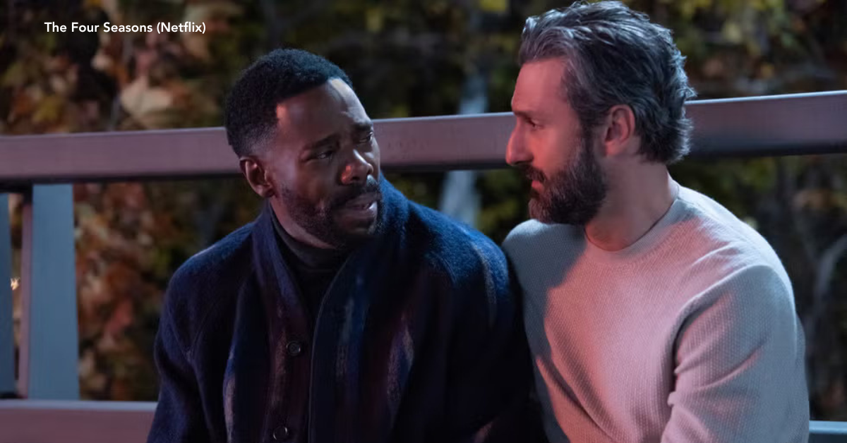 Two men at a park bench speaking to each other about something emotional.